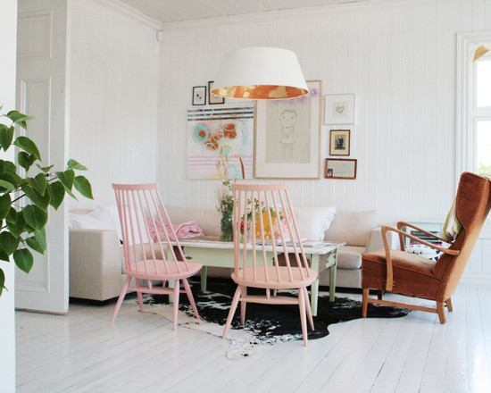 inspiring-white-paint-for-midcentury-living-room-also-pink-side-chair-plus-ikea-shade-pendant-and-brown-armchair-as-well-as-wall-art-decor