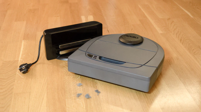 robot vacuum cleaner with its charger.