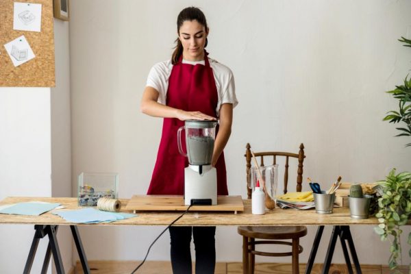 Women using a mixer grinder